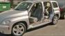 A car is seen in this undated file photo after it was stripped of its doors at a car dealership in Northern California.