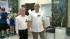 Supreme Court takes up gay marriage cases :: Two men walk by cameras after getting married in this undated file photo.