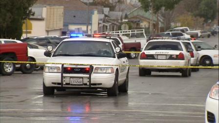 Sheriffs vehicles are seen in Taft, where a student opened fire at Taft High School on Thursday, Jan. 10, 2013.