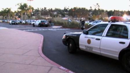 San Diego police respond to the scene of a movie theater shooting at Carmel Mountain Ranch movie theater on Saturday, Jan. 12, 2013.