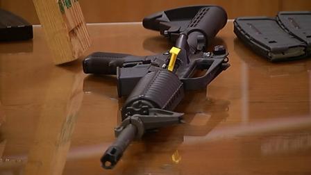 A weapon is seen at a gun control hearing in Sacramento on Tuesday, Jan. 29, 2013.