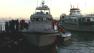 U.S. Coast Guards are seen at the scene of a crash after a Golden Gate Ferry crashed with a 22-foot-long pleasure boat in San Francisco Bay on Saturday, Feb. 17, 2013. Two people were injured.