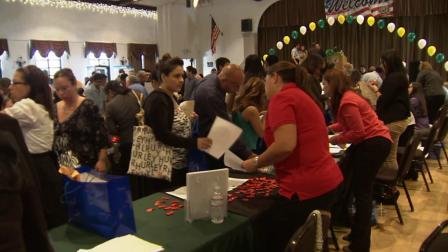 Job-seekers are seen at the El Monte Community Center where a job fair was held on Friday, June 21, 2013.