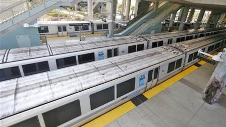 Bay Area Rapid Transit trains are shown sitting on the platform at the station in Millbrae, Calif., Monday, July 1, 2013.
