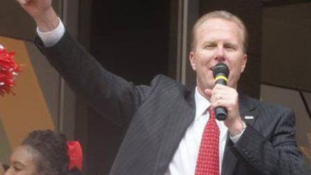 San Diego City Councilman Kevin Faulconer speaks at a SDSU rally in downtown on February 25, 2011.