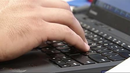 A person is seen typing on a laptop computer in this undated file photo.