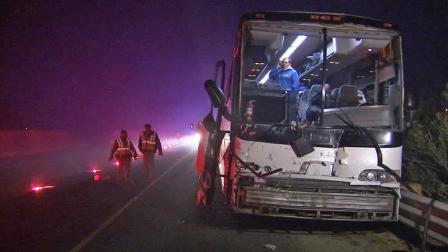 A tour bus from Los Angeles slammed into a semi-truck in Central California, injuring more than a dozen people on Tuesday, Jan. 14, 2014.