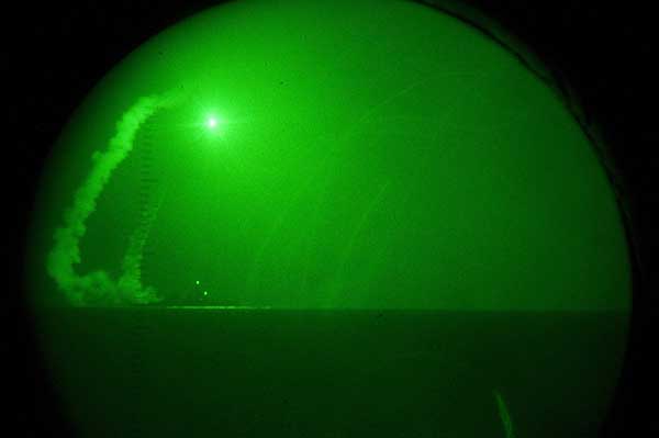 Seen through night-vision lenses aboard...