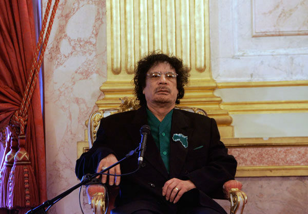 Libyan leader Moammar Gadhafi meets with...