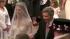 Kate Middleton walks down the aisle Kate Middleton walks down the aisle - in a ivory and white satin dress by Sarah Burton at Alexander McQueen - with her father, Michael Middleton. - Provided courtesy of KABC