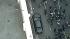 A cars windows were shattered during a riot in...