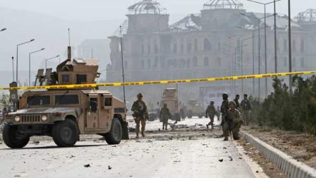 US soldiers secure the site of a suicide car bomber in Kabul, Afghanistan, Saturday, Oct. 29, 2011.