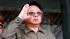North Korean leader Kim Jong Il salutes during a...