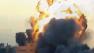 Explosions from Israeli airstrikes are seen on Tuesday, Nov. 20, 2012.