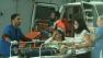 Wounded people are treated by emergency responders after a bomb exploded aboard an Israeli bus near the nations military headquarters in Tel Aviv on Wednesday, Nov. 21, 2012.