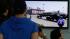 South Koreans watch TV news showing a footage of North Korean missiles on a military parade, at a Seoul Train Station in Seoul, South Korea, Saturday, May 18, 2013.