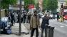 A photo shows a woman confronting two accused terrorists who had just killed a British soldier.