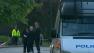 Police investigate the area where a man was hacked to death in London on Wednesday, May 22, 2013.