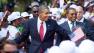 U.S. President Barack Obama shakes the hands of a line of women stationed to welcome his arrival, accompanied by Tanzanian President Jakaya Kikwete, right, at State House in Dar es Salaam, Tanzania Monday, July 1, 2013.