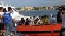 An Italian Coast Guard boat carry rescued migrants as they arrive in the port of Lampedusa Thursday, Oct. 3, 2013.