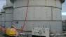 This photo released by Tokyo Electric Power Co. shows the storage tank which workers detected the water dripping from the top, at the Fukushima Dai-ichi nuclear plant at Okuma town in Fukushima prefecture, northeastern Japan Thursday, Oct. 3, 2013.