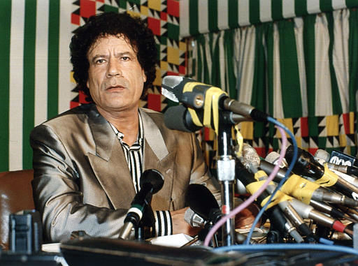 Libyan leader Moammar Gadhafi is seen here at a press conference in Tripoli, Libya, Aug. 21, 1990.