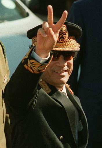 Libyan leader Moammar Gadhafi, makes a peace...