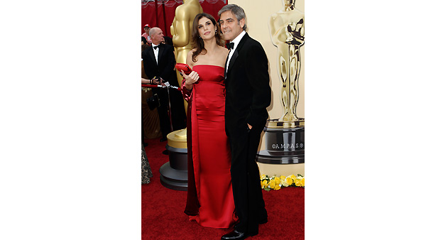 George Clooney and Elisabetta Canalis arrives during the 82nd Academy Awards Sunday, March 7, 2010.