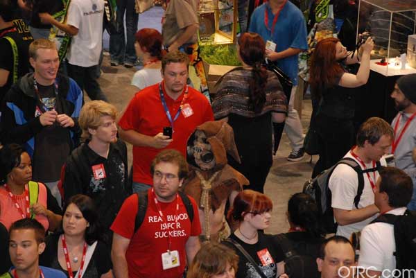 The crowd swarms around the convention floor at...