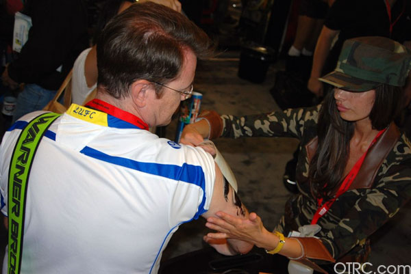 An attendee gets 'The Expendables' temporary...