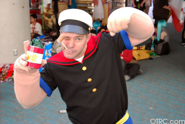 A fan dressed as Popeye the Sailor is seen...