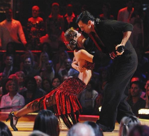 Audrina Patridge and Tony Dovolani perform on...