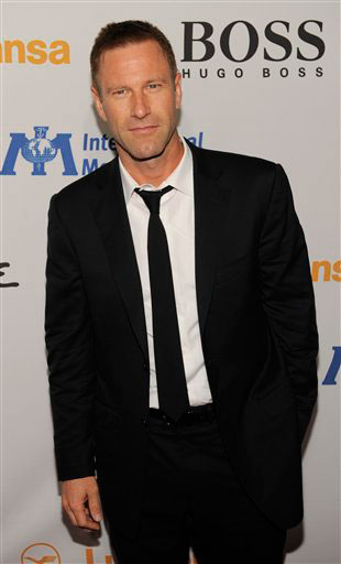 Aaron Eckhart arrives at the Esquire House LA...