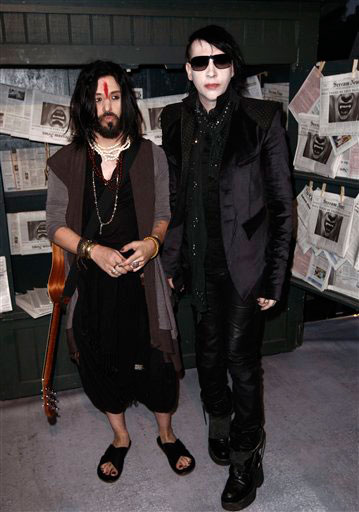 Marilyn Manson, left, and Twiggy Ramirez arrive...