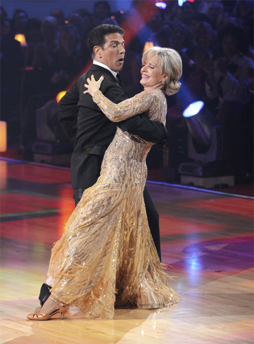 Florence Henderson and Corky Ballas perform to...