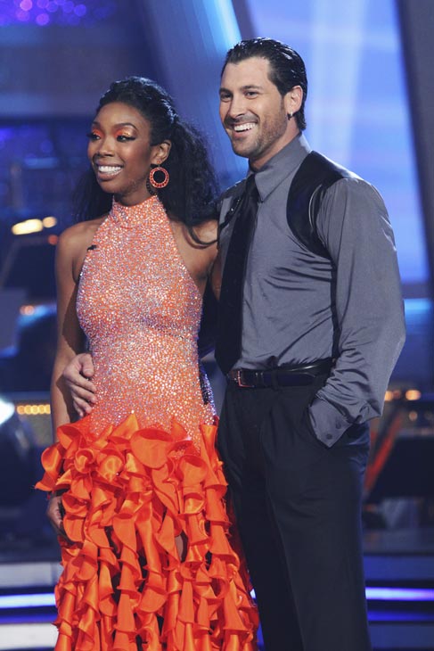 Brandy and Maksim Chmerkovskiy appear before the...