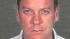 Booking photo of Keifer Sutherland courtesy of...