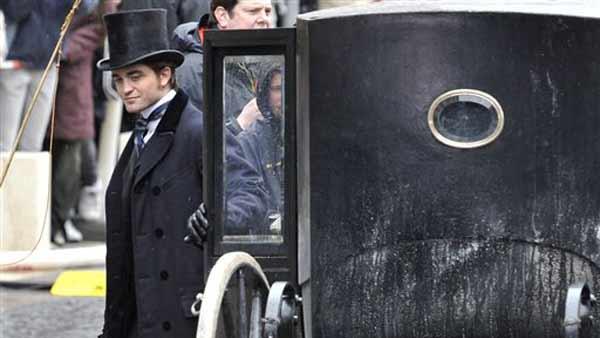 British actor Robert Pattinson, star of Twilight, leaves a carriage during the filming of 'Bel Ami' in Budapest, Hungary, Tuesday, April 6, 2010.
