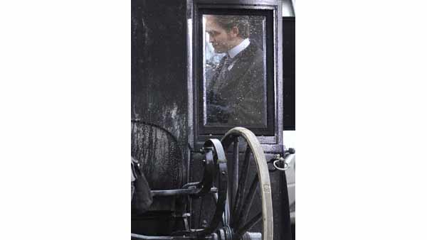 British actor Robert Pattinson, star of Twilight, walks on the set of his new film 'Bel Ami' in Budapest, Hungary, Tuesday, April 6, 2010.
