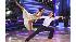Nicole Scherzinger and Derek Hough perform on...