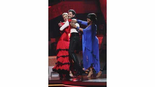 ESPN reporter Erin Andrews and partner Maksim Chmerkovskiy react to being safe on 'Dancing With the Stars: The Results Show,' Tuesday, April 13, 2010. The couple scored 39 points out of 60 on Monday's show.