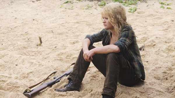 Claire Littleton (Emilie de Ravin) sits on the beach.