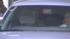 Lindsay Lohan sits in the back of the car that...
