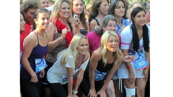 Kelly Ripa and actress Kristin Chenoweth take their spots at the head of the race group at the High Heel-a-thon.