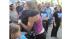 High Heel-a-thon winner Ida Bernstein hugs her...