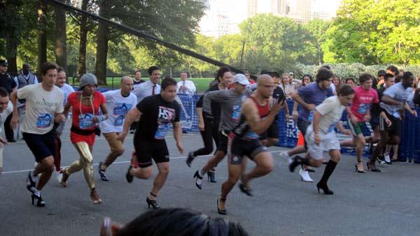 The men take off at the start of their race in the second High Heel-a-thon in Central Park.
