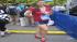 Miss USO Heidi Ferren prepares to run in the...