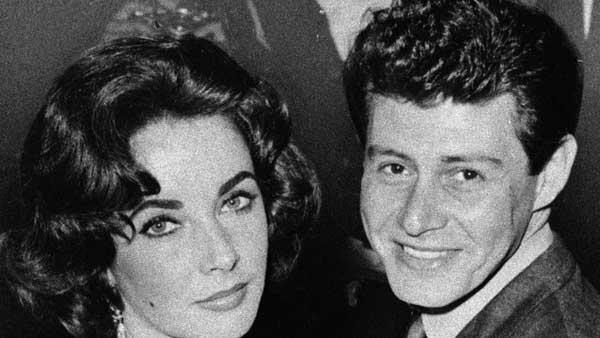 In this 1959 file photo, actress Elizabeth Taylor is seen with singer Eddie Fisher before their marriage. He died Wednesday night. He was 85.