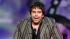 Greg Giraldo is seen onstage during the Comedy...
