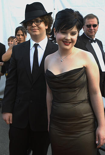 Show hosts Jack, left, and Kelly Osbourne pose...